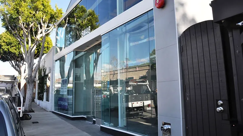 Full-height storefront glazing filmed end to end without changing how the frontage reads.